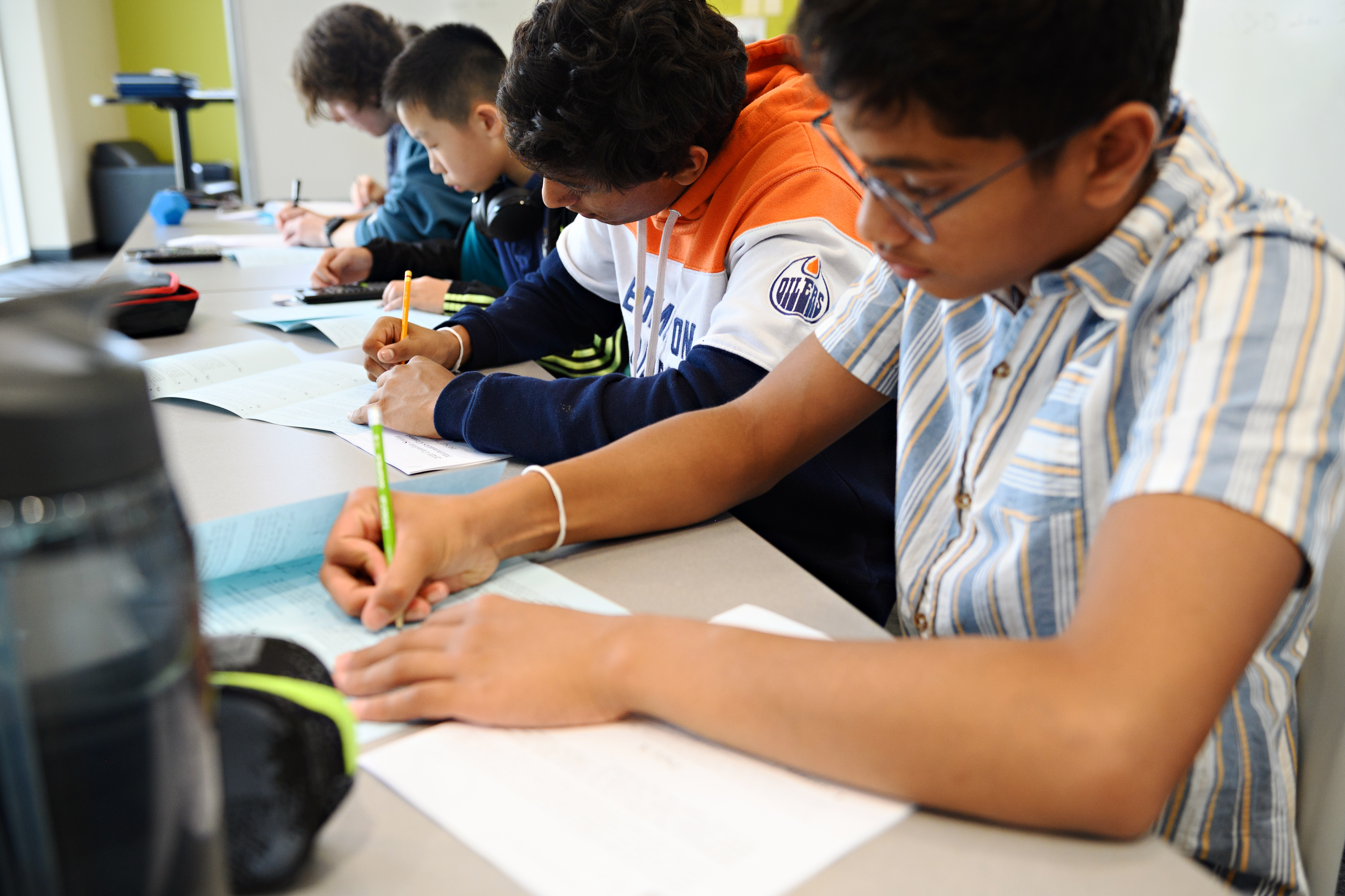 Students working on math contests in the classroom
